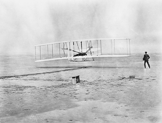 The Wright Brothers' First Flight. From the General Negative Collection, North Carolina State Archives, call #: N.63.9.27_WRIGHT_BROS_1ST_FLIG. Raleigh, NC.