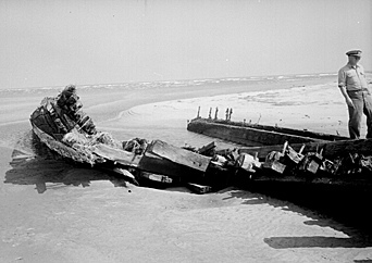 Unknown wreck fround in 1944, Ocracoke or Hatteras. NC, photo taken by Brown. From Conservation and Development Department, Travel and Tourism photo files, North Carolina State Archives, Raleigh, NC, call #: ConDev4876C.